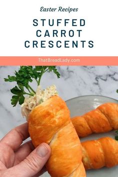 someone is holding up some carrots with the words stuffed carrot crescents on them