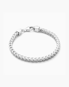 Stand out in one of our sharpest styles. The 3mm silver Franco Bracelet is best known for its sleek arrow or chevron-shaped links. Expertly crafted and durably made in Italy, wearing this piece will give you strength and confidence. Franco Bracelet, Silver Chain For Men, Solid Gold Chains, Silver Coat, Silver Chain Bracelet, Silver Shop, Men's Rings, Pendant Bracelet, Silver Man