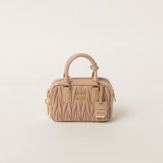 Sand Beige Arcadie Matelassé Nappa Leather Bag | Miu Miu Nappa Leather Bag, Lettering Logo, Sand Beige, Nappa Leather, Miu Miu, Three Dimensional, Leather Bag, Modern Design, Leather