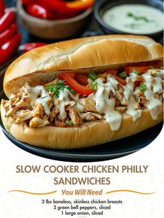 a chicken philly sandwich on a plate with ranch dressing and peppers in the background