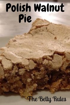 a close up of a piece of food on a plate with the words polish walnut pie