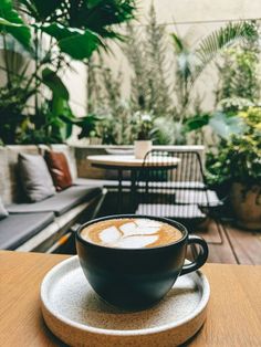 a cup of coffee sitting on top of a saucer