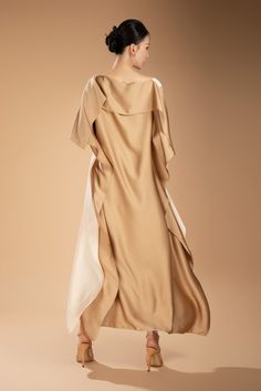 Made from a luxurious silk blend, this ankle-length dress offers a sophisticated and elegant look. Its boat neck design adds a touch of class, making it perfect for any occasion. Experience this timeless and versatile piece in your wardrobe.  Length: From 125cm to 130cm Pre-draped Formal Silk Maxi Dress, Elegant Beige Draped Midi Dress, Elegant Beige Draped Dress, Silk Beige Evening Midi Dress, Gold Silk Dress For Evening, Gold Silk Evening Dress, Pre-draped Silk Crepe Maxi Dress, Cream Silk Midi Dress For Evening, Cream Silk Evening Midi Dress