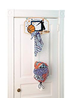 a white door with a basketball hanging on it