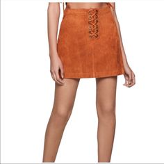 Bcbgeneration Faux-Suede Lace-Up Mini Skirt Nwt Size: 0 Color: “Spice” Create A Sleek Southwest-Meets-Urban Aesthetic In This Bcbgeneration A-Line Skirt In Soft Faux Suede Accented With Edgy Lace-Up Ties And Matte Hardware. Hidden Back Zipper With Hook-And-Eye Closures Lined Short Length; A-Line Silhouette Allover Faux Suede; Lace-Up Detail And Grommets At Front Machine Washable Shell: Polyester; Lining: Cotton Faux Suede Skirt, White Flares, Suede Skirt, Unisex Baby Clothes, Black Midi Skirt, Skirts Online, Suede Lace, Trendy Plus Size, A Line Skirt