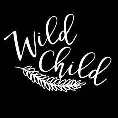 the word wild child written in white ink on a black background with leaves and branches