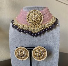 Fine Quality Light Pink Gray Kundan Choker Necklace with Earrings Ethnic Wear. Can be worn for engagement and wedding parties. Indulge in it or gift it and watch the compliments flow! It is advisable to store jewelry in a zip lock pouch (air tight pouch), keep away from water perfume and other chemicals and clean it with dry and soft cloth. FREE SHIPPING!! Bollywood Style Heavy Traditional Wear For Celebrations, Heavy Tikka For Eid Celebration, Festive Bollywood Kundan Necklace, Bollywood Style Tikka For Eid Celebration, Traditional Heavy Tikka For Party, Heavy Bollywood Tikka For Celebrations, Traditional Kundan Necklace For Navratri Party, Bollywood Kundan Necklace For Navratri Party, Traditional Kundan Necklace For Party And Festivals