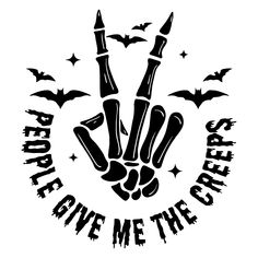 a black and white image of a hand holding two bats with the words, free to be