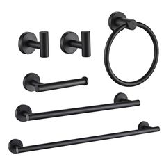 an assortment of black bathroom accessories including towel rings, toilet paper holders and soap dispenser