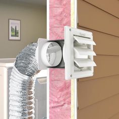 a duct outlet attached to the side of a house with pink and brown siding on it