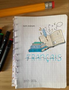 an open notebook with the words franganis written on it