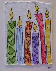 a painting of candles with hearts on the bottom and one candle lit in different colors