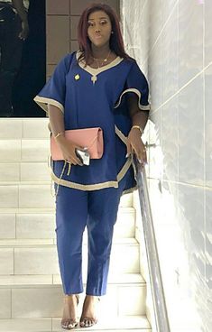 Authentic African clothing for women. Do you love wearing fashionable African outfits made of high quality fabrics with top notch tailoring? If yes, kindly place your orders for this Women clothing. We do for individuals, groups, couples and even families and cater to both males and females. All outfits are made to order for exact fit per customer wishes. This particular outfit comes in Blue with Gold embroidery which makes it the perfect outfit for your event. The design is available in several Two-piece V-neck Sets, African Outfits, African Dresses Modern, African Wear Dresses, African Fashion Modern, African Print Dresses, African Print Fashion Dresses, African Men Fashion, African Clothing Styles