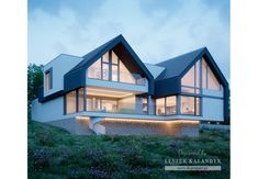 a large white house sitting on top of a lush green hillside