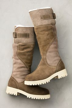 Command cold-weather style with rustic warmth and femininity in the Tabitha tall boots. These beauties offer protection from the elements with their waterproof Italian leather and suede construction, and keep you steady on your feet with treaded TPR outsoles. Inside, your feet and lower legs will be embraced by plush shearling lining with a wool cuff, lending natural warmth, insulation, and breathability. Finishing off this handsome wear-everywhere design are buckles at the calf and inner zippers for easy on/off. Rugged Winter Waterproof Boots With Suede Lining, Rugged Waterproof Boots With Suede Lining For Winter, Rugged Shearling Boots For Outdoor, Rugged Outdoor Shearling Boots, Leather Boots For Women, Waterproof Suede Boots, Women's Winter Boots, Ankle Cowboy Boots, Riding Boots Fashion