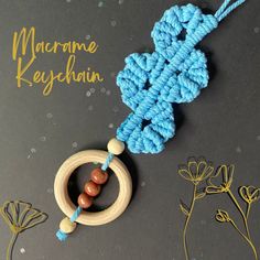 a crocheted keychain with beads on it