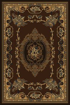 a brown rug with an ornate design on the top and bottom, along with gold trimming