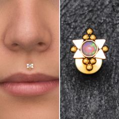 a woman's nose and nose ring with an opal stone in the middle