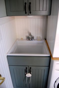 the kitchen sink is clean and ready for us to use in its new owner's home