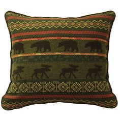 a decorative pillow with moose and snowflakes in green, red, yellow and brown