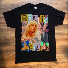 a black t - shirt with an image of blond haired woman