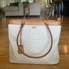 Authentic-Purchased From Michael Kors In December 2018. Very Clean. No Visible Imperfections. Beautiful Purse With Lots Of Storage Areas And Dividers. White Monogram Canvas Bag For Everyday, White Monogram Canvas Bags For Everyday Use, White Monogram Canvas Shoulder Bag With Branded Hardware, White Monogram Canvas Shoulder Bag With Double Handle, White Monogram Canvas Tote Bag, White Monogram Canvas Shopping Bag, White Monogram Canvas Shoulder Bag For Everyday Use, Everyday White Monogram Canvas Shoulder Bag, Everyday White Monogram Canvas Bag