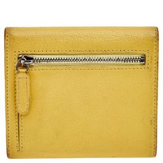 CHANEL Yellow Leather Trifold WalletPetite in shape and classy in aesthetic this wallet from the House of Chanel will certainly bring charming vibes to your everyday outfit. It is created from yellow leather with a CC motif embellishing the front. The wallet has a trifold style which reveals a leather fabric interior. Carry this functional piece with you as you head out Size: Height: 2.5 cm Width: 2 cm Length: 12 cmMaterial: Leather Leather Trifold Wallet, In Aesthetic, Gold Ounce, Yellow Leather, Trifold Wallet, Leather Fabric, Chanel Bag, Luxury Bags, Everyday Outfits