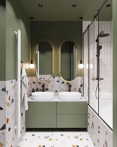 a bathroom with two sinks, mirrors and a walk - in shower next to each other