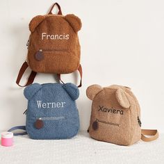 The Teddy Bear Backpack is a handmade and personalized accessory that is perfect for toddlers and young children. It features a cute teddy bear design made from soft and plush materials, ensuring comfort and scratch-free experience. With its adjustable shoulder straps and top handle, it can be easily adjusted to provide the most comfortable fit for your child. The backpack is not only practical but also versatile, making it suitable for everyday use, such as school, travel, playdates, and even a Cute Customizable Backpack For Gifts, Cute Customizable Backpack For Gift, Cute Bear Design Bags For Gifts, Cute Bear Design Bags For Gift, Cute Bear Design Bags As Gifts, Personalized Cute Backpack For Gift, Personalized Cute Rectangular Backpack, Teddy Bear Backpack, Teddy Teddy