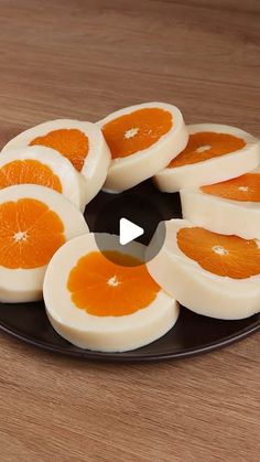 an image of sliced oranges on a plate with the video showing them in full view