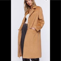 Available In S And L New With Tags Details A Woven Trench Coat Featuring Notched Lapels, Long Sleeves, Button-Font Closures, Front Flap Pockets, And A Longline Hem. Content + Care - Shell: 88% Polyester, 12% Rayon - Lining: 100% Polyester - Hand Wash Cold Size + Fit - Model Is 5'8" And Wearing A Small Camel Outerwear With Button Closure For Fall, Forever 21 Button-up Outerwear, Plus Size 90s, Long Quilted Coat, Pink Fur Coat, Black Hooded Jacket, Black Jean Jacket, Cropped Puffer Jacket, Cropped Zip Up