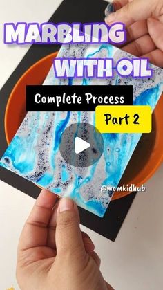 someone is making something with oil on the paper and it looks like they are doing something