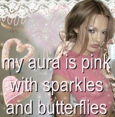 a girl in pink shirt with sparkles and butterflies on her face next to the words, my aura is pink with sparkles and butterflies