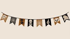 a halloween banner with skulls and spider webs