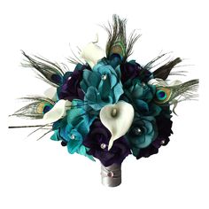 a bridal bouquet with peacock feathers and flowers on the side, isolated against a white background