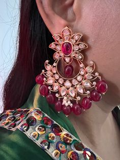 These antique Red Kundan earrings with red droplets will add the perfect charm to your festive wear. Length 8 cms Width 5.7 cms Weight 68 grams a pair Red Earrings Indian, Traditional Red Pearl Earrings For Party, Elegant Red Chandelier Earrings For Festive Occasions, Elegant Red Festive Chandelier Earrings, Festive Red Elegant Chandelier Earrings, Formal Red Pearl Earrings With Matching Set, Red Earrings For Formal Festive Occasions, Red Bridal Earrings For Festive Wedding, Red Bridal Earrings For Wedding