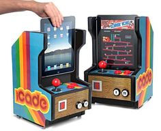 an image of two arcade machines that are playing games