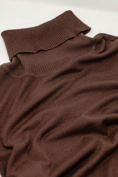 Introducing our Fine Knit High Neck Jumper in a warm and earthy brown shade – a testament to comfort and timeless style. This super-comfortable high neck sweater is delicately crafted in a very fine knit, ensuring a luxurious feel that's perfect for any occasion. The standard fit and rib detailing at the neck add a touch of refinement to this wardrobe essential.  Versatility meets sophistication as you can effortlessly pair this jumper with jeans or skirts, making it the go-to basic piece for your closet. The turtleneck neckline exudes elegance and warmth, while the long sleeves and bodycon fit contribute to a stylish and flattering silhouette.  Designed for daily wear, this Fine Knit High Neck Jumper seamlessly blends comfort with fashion. The fine knit composition, featuring 48% Viscose, High Neck Jumper, Fitted Jumper, Brown Shade, High Neck Sweater, Brown Shades, Knitwear Tops, Medium Brown, Fit Style, Daily Fashion