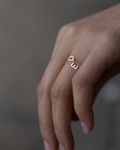 Dainty 14K Initial Letter Ring: Barely there ring in 14k Gold with a small block Letter Modern and timeless Super Dainty Link Chain Ring Simple, minimalist everyday Alphabet Initial Ring - Perfect as a stacking ring or by itself. Each initial measures approx. 4.8mm Available in 14K Yellow Gold or 14K White Gold SIZE: US4.5 - 10 Letter: A-Z or an heart charm * Leave us your initial in the comment box at checkout. # Personalized ring Statement rings meaningful gift mom ring chain ring initial chai Chain Ring Gold, Long Chain Earrings, Mom Ring, Lace Ring, Dainty Gold Rings, Diamond Heart Ring, Freshwater Pearl Ring, Zierlicher Ring, Letter Ring