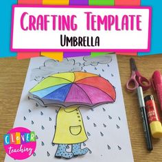 the crafting template umbrella is next to some markers and crayon pencils