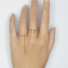 From our Elements collection, wear one or collect them all for the perfect stack! This ring is made with diamond cut bead chain, super shimmy fun with one round natural champagne diamond. Because it's a chain ring, we recommend to order a half size up. Details: -14k yellow gold -natural champagne round diamond -handmade in NYC Minimalist Open Ring With Diamond Accents, Minimalist Open Ring With Single Cut Diamonds, Adjustable Open Ring With Single Diamond, Fine Jewelry Open Ring With Single Diamond, White Gold Diamond Toe Ring, Adjustable Diamond Open Ring, Gold Plated Fine Jewelry Chain Ring, Fine Jewelry Gold Midi Rings With Single Diamond, Gold Midi Rings With Single Diamond For Fine Jewelry