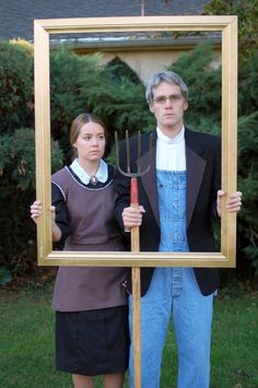 a man and woman standing in front of a framed photo holding a garden tool, with the caption american gothic your love is a work of art