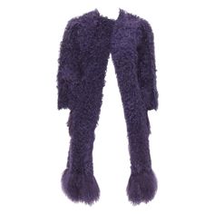 MIU MIU purple curly shearling fur contrast hem 3/4 sleeve coat IT36 XS Reference: CELG/A00150 Brand: Miu Miu Designer: Miuccia Prada Material: Fur Color: Purple Pattern: Solid Closure: Hook & Eye Extra Details: Hook eye closure. Long fur trimming at pocket and hem. Made in: Italy CONDITION: Condition: Excellent, this item was pre-owned and is in excellent condition. SIZING Designer size: IT36 Size reference: US00 / UK4 / IT36 / FR32 / XXS MEASUREMENTS: Shoulder to shoulder: 35cm / 13.7" Chest: Traditional Chic, Chloë Sevigny, Chanel Collection, Longline Coat, Chic Leather, Black Tweed, Drew Barrymore, Miuccia Prada, Velvet Trim