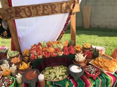 a table filled with lots of different foods and desserts on top of each other