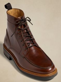 Our take on rugged luxury, this leather lace-up boot borrows its toe box construction from traditional moccasins, while quick-lace hooks at the top make for easy on-off.  Best of all, we selected a beautiful leather quality from Spain for its rich, pecan brown color.  Leather uppers and lining.  Leather, EVA, and rubber soles.  Foam footbed for comfort.  Made in Portugal.  Whole and half sizes. Dress Up Shoes, Box Construction, Moc Toe Boots, Cigars And Whiskey, Leather Lace Up Boots, Leather Boot, Leather Lace, Suede Boots, Cigars