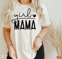 a woman wearing a t - shirt that says girl mama