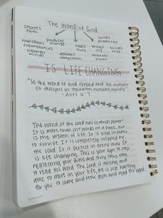 an open notebook with writing on it that says, the word of god is life changing