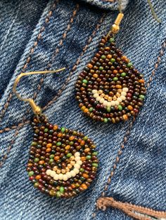 Cute tortoise shell colored hand woven seed bead earrings. Cute to dress up or dress down. Looks great with a pair of blue jeans and your favorite fall boots! Handmade Brown Teardrop Beaded Earrings, Handmade Casual Beaded Earrings, Casual Handmade Beaded Earrings, Brown Beaded Teardrop Jewelry, Brown Teardrop Beaded Earrings, Brown Teardrop Beaded Earrings With Colorful Beads, Bohemian Brown Woven Jewelry, Artisan Brown Earrings With Colorful Beads, Casual Colorful Beaded Earrings For Beach