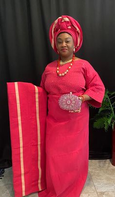 4 pieces set Aso Oke for women, Buba/Iro/Gele/Ipele for wedding and special occasions.Made with  quality cotton Aso Oke in Nigeria. Complete set for women  Buba/Top Iro/wrapper  Gele/head tie/ pre wrap (NOT Autogele ) Ipele/shouldergear   Color : Fushia pink  Customize color can be made. Elegant Pink Sets For Traditional Ceremonies, Elegant Wedding Sets With Traditional Patterns, Elegant Traditional Wear With Patterns For Party, Elegant Traditional Wear With Traditional Patterns For Party, Elegant Pink Formal Traditional Wear, Elegant Formal Sets With Traditional Patterns, Elegant Sets With Traditional Patterns For Ceremony, Traditional Pink Ceremony Sets, Pink Traditional Sets For Ceremonies