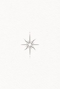 a white paper with a black and white drawing of a snowflake on it